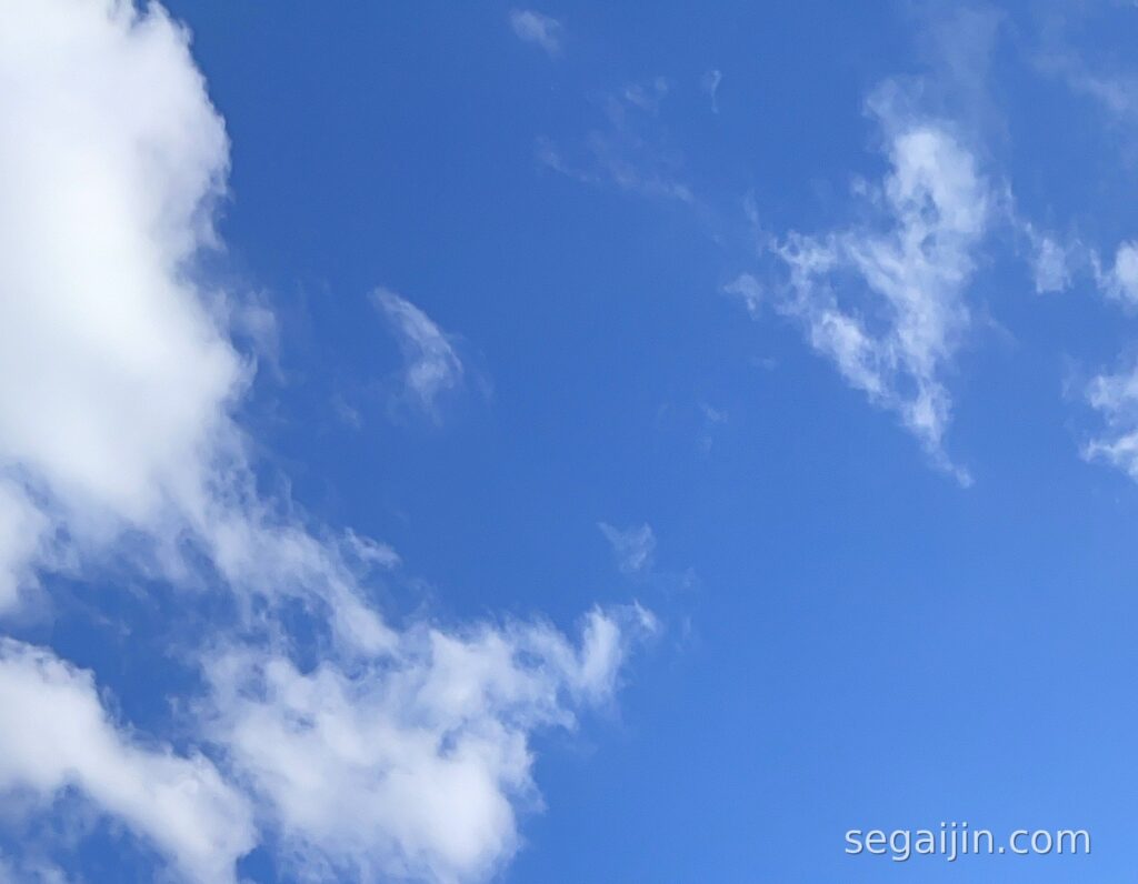 Bright blue sky with white clouds, the feeling of a journey beginning